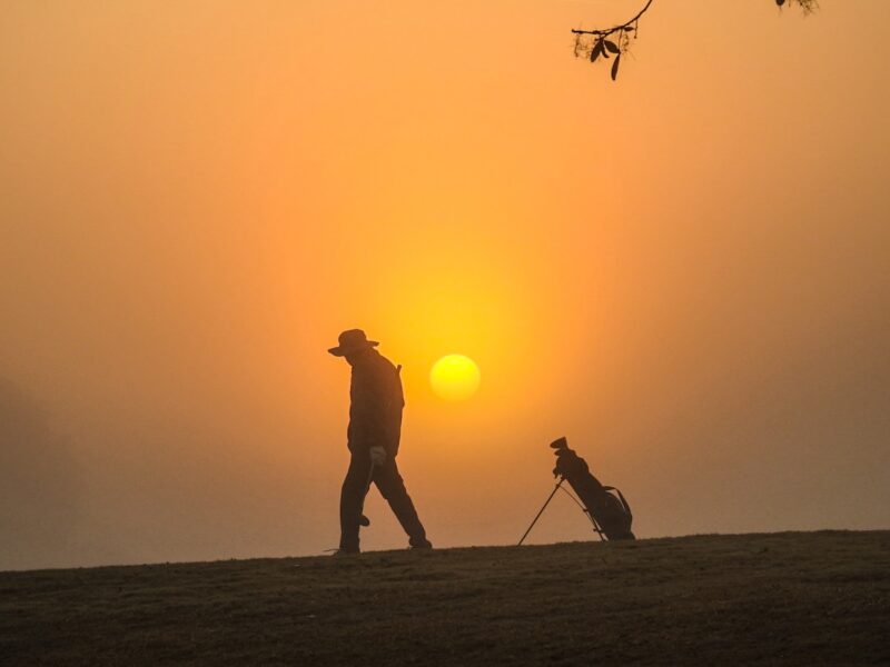Golfer greets sunrise at Briarwood Executive Golf Course