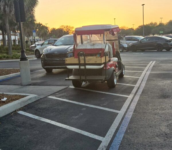 The driver of this golf cart was showing no respect for the handicapped at Mulberry Grove Plaza The driver of this golf cart was showing no respect for the handicapped at Mulberry Grove Plaza