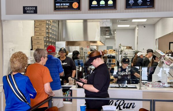 Villagers were lining. up to order bagels at Jeff s Bagel Run Villagers were lining. up to order bagels at Jeff s Bagel Run