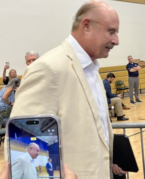 Dr. Phil entered the venue moments before President Trump took the stage