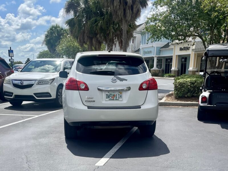 The Parking Patrol shot this photo of a car straddling two parking spots at Pinellas Plaza