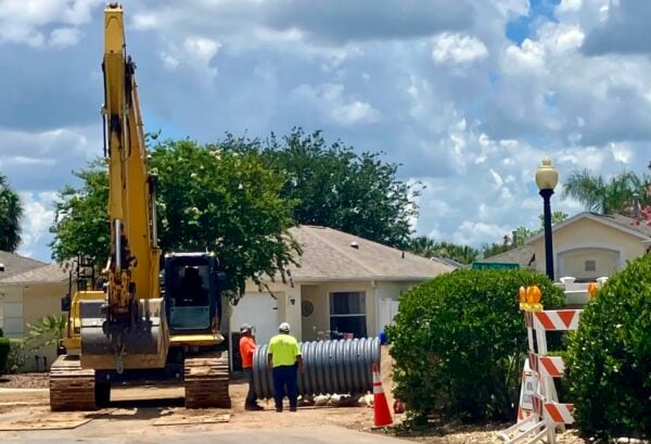 A crew was worknig to put down pipe at Victoria Lane and Parlange Terrace in the Camerno Villasand A crew was worknig to put down pipe at Victoria Lane and Parlange Terrace in the Camerno Villasand