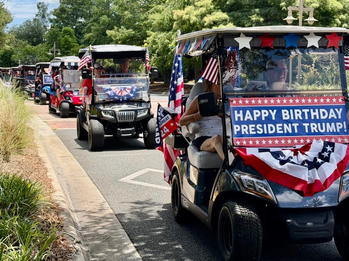 Villagers take to the streets to wish President Trump a happy 80th birthday