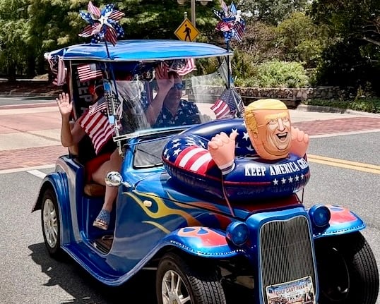 Several carts sported inflatible Trump figures Several carts sported inflatible Trump figures
