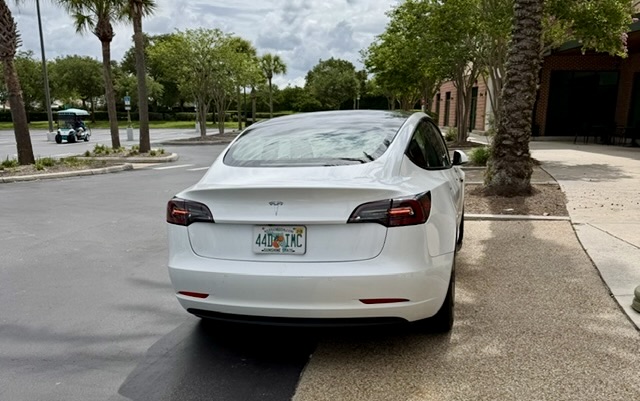 The person driving this Tesla found some special parking in The Villages.
