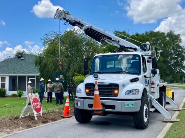 A SECO crew replaced a electrical box Wednesday afernoon in the Village of Virginia Trace after the crash A SECO crew replaced a electrical box Wednesday afernoon in the Village of Virginia Trace after the crash