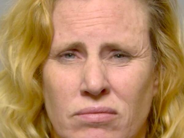 Lady DUI suspect sipping Budweiser beer found parked in bicycle lane