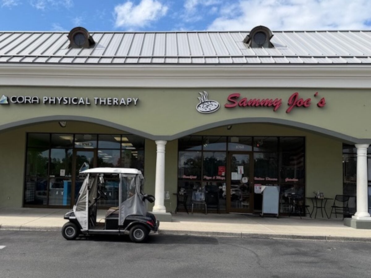 Golf carts enjoy plenty of entitled parking at Mulberry Grove Plaza