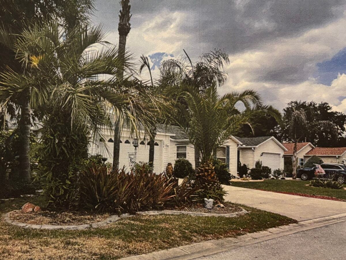Villager called to hearing contends deed violation already existed when she bought home