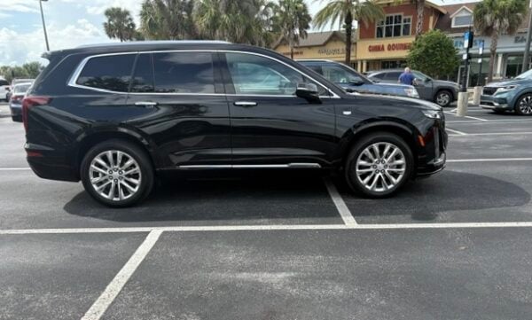This SUV was clearly over the line while parked at Lake Deaton Plaza This SUV was clearly over the line while parked at Lake Deaton Plaza