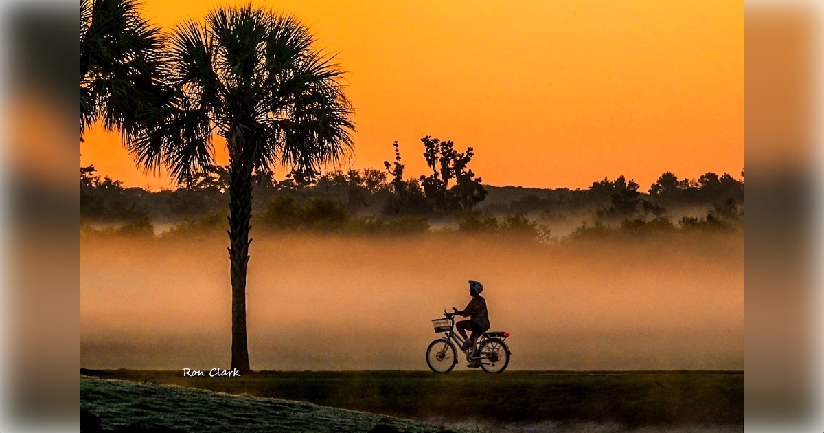 Misty sunrise paints the sky for a morning bike ride on Hogeye Pathway